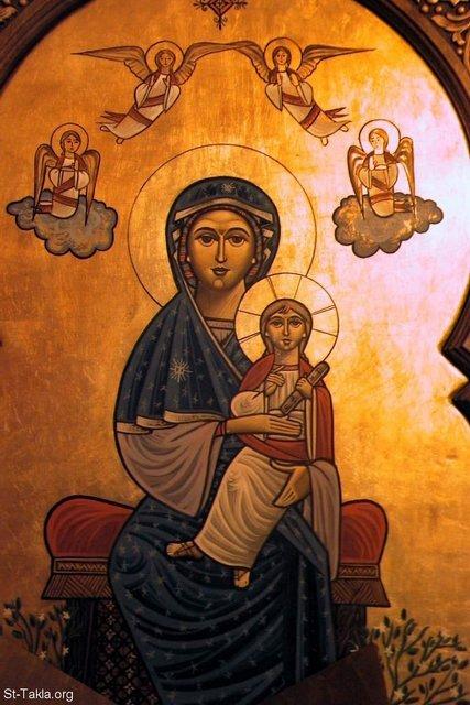 Coptic icon of Saint Mary the Theotokos holding the Christ child, surrounded by four angels